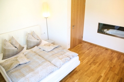 Schlafzimmer Appartement Wasserlilie – Seevilla Cattina – Appartements direkt am Millstätter See in Kärnten